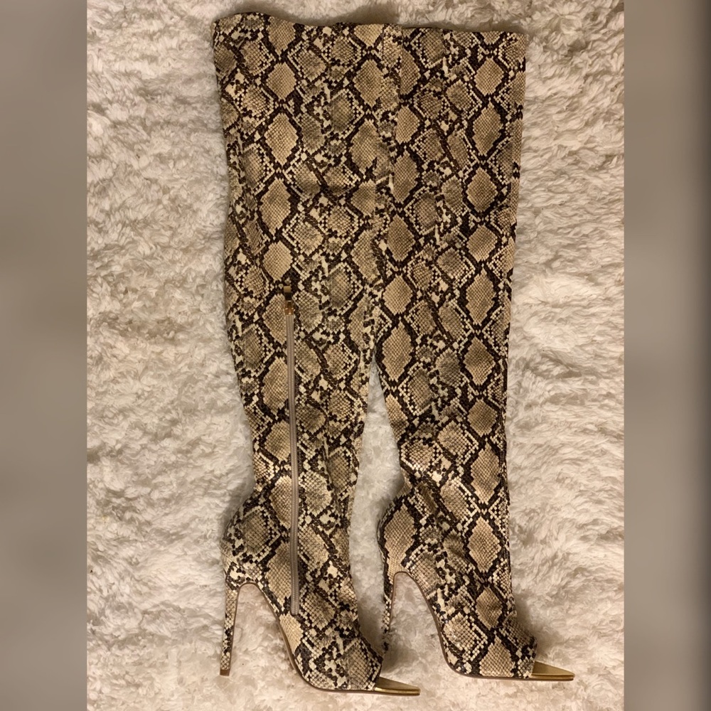 Over the knee snake print boots